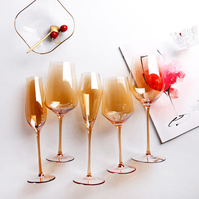 明確な水晶ワイン グラスの口によって吹かれる電気版のこはく色のシャンペン フルート サプライヤー