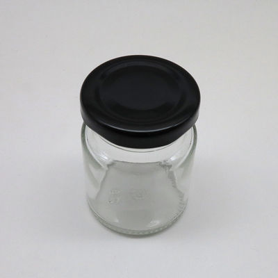 空の食糧貯蔵のねじ金属のふたが付いているガラス込み合いの瓶の丸型の耐久財 サプライヤー